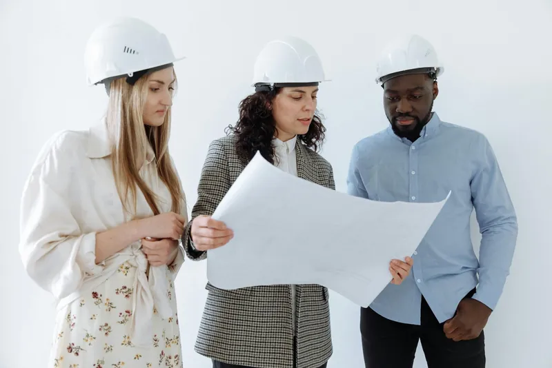 Contractors reviewing project plans