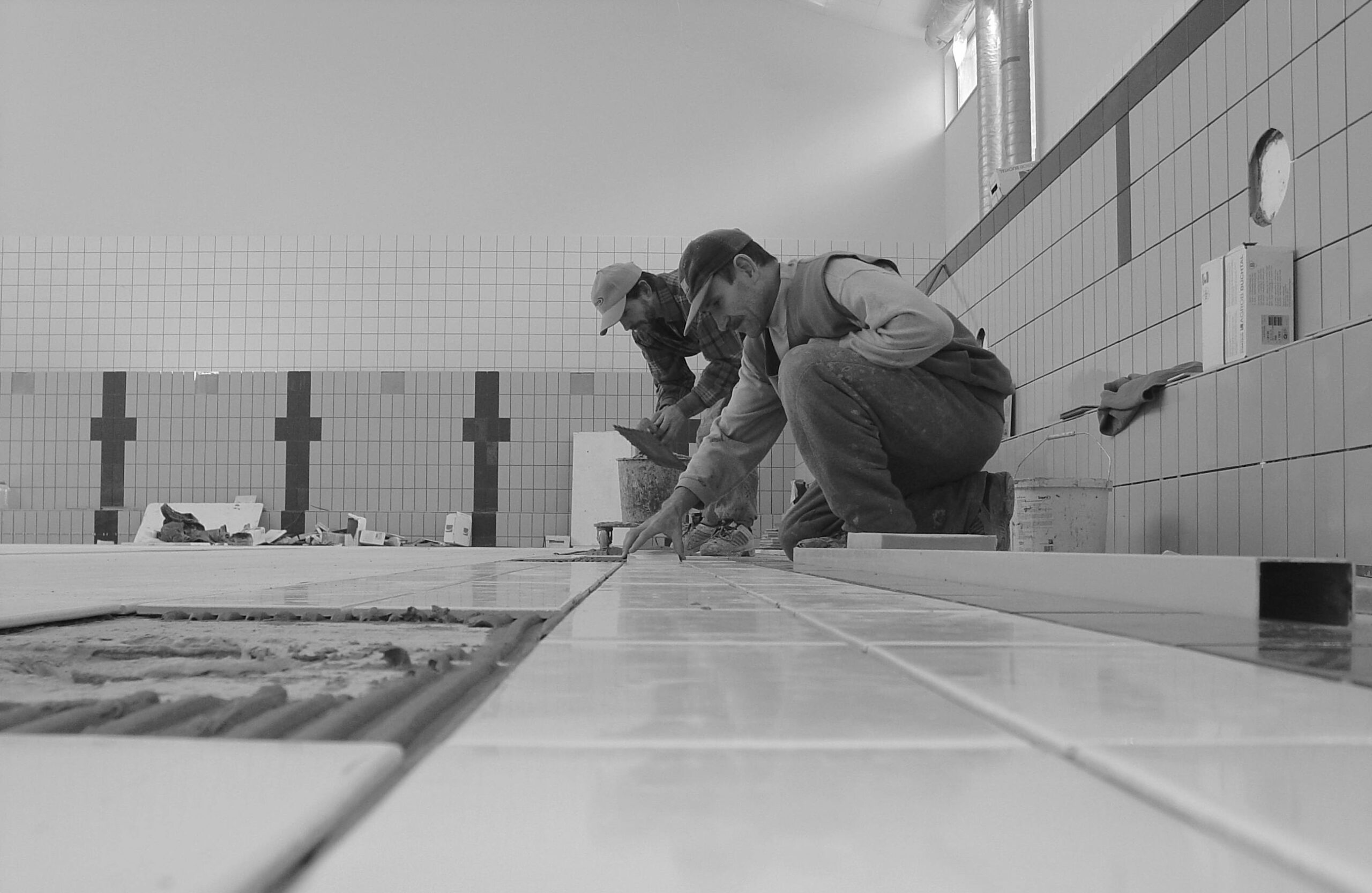 Two Carpenters in a Bathroom